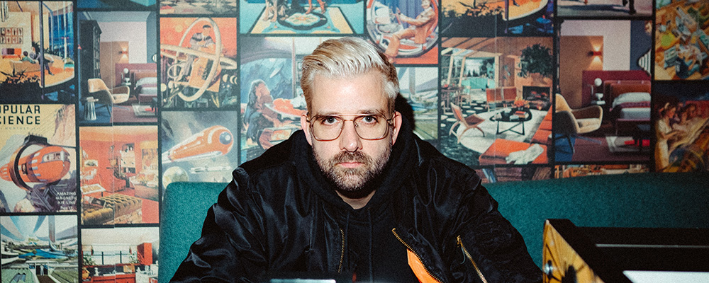 A press picture showing DJ Steve Clash performing